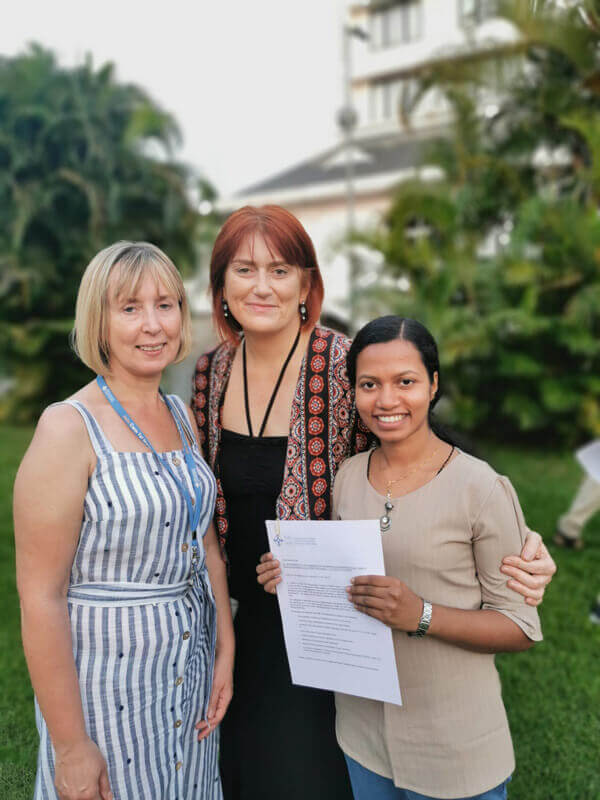 Nicola and Sharon with nurse accepting letter of employment